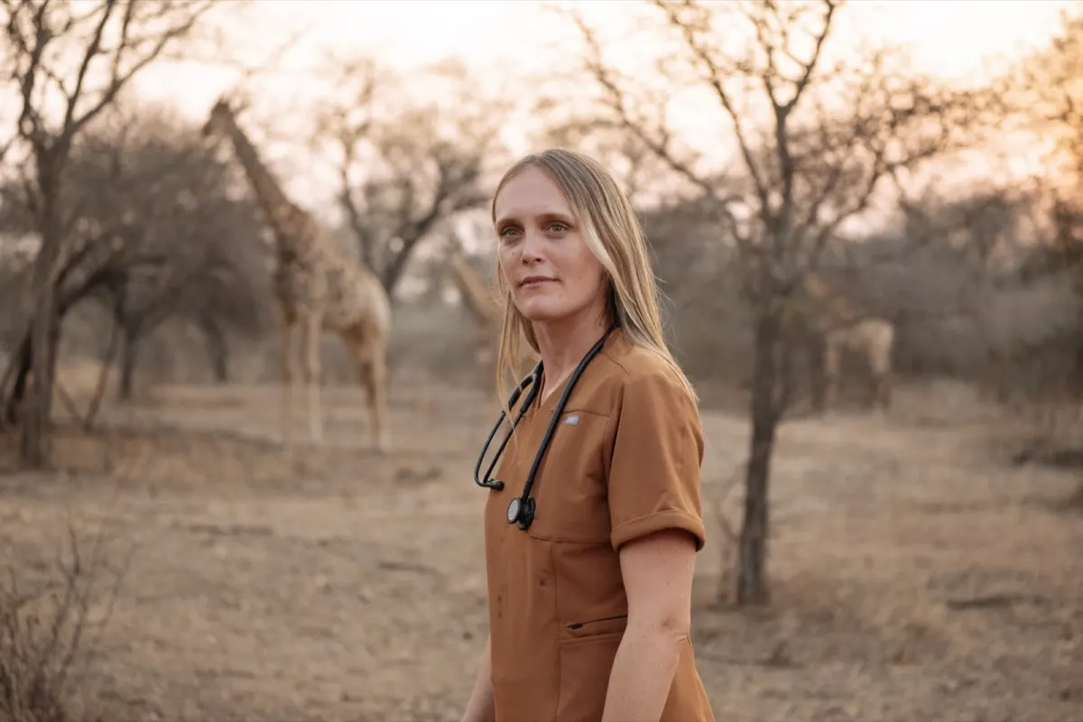 Dr Chloe Buiting with giraffes