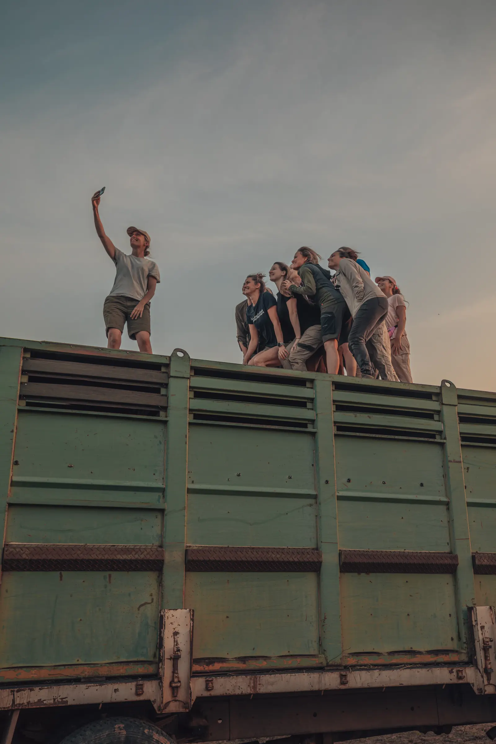Dr Chloe Buiting by a field truck