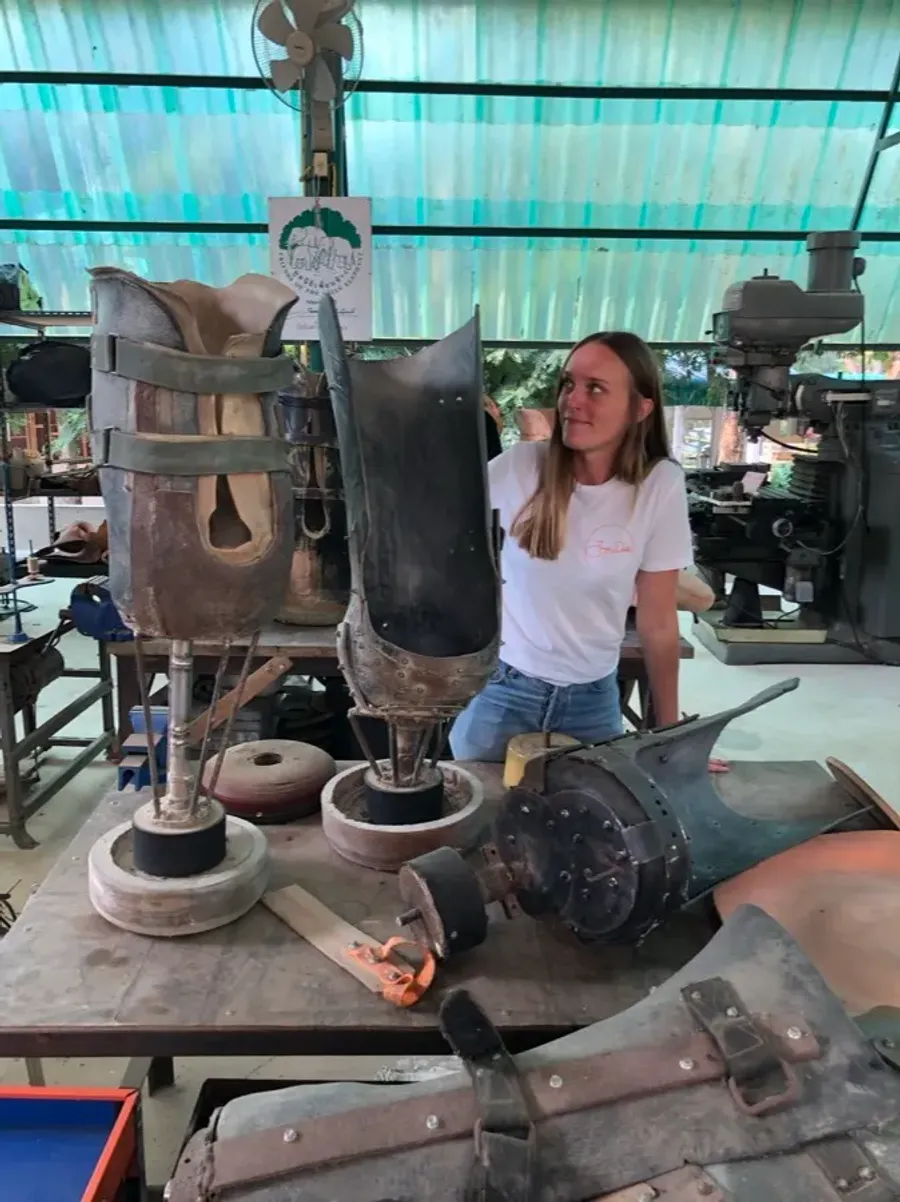 Chloe in the workshop making an elephant's prosthetic leg
