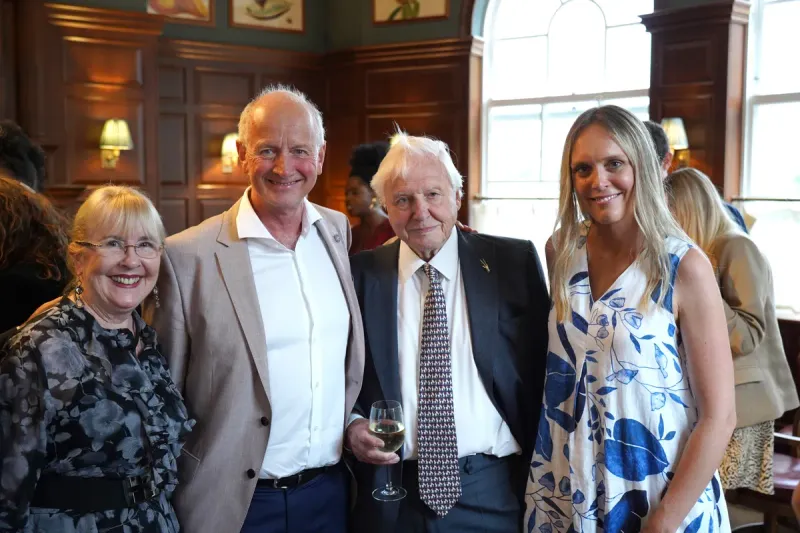 Chloe with Sir David Attenborough and guests at an event